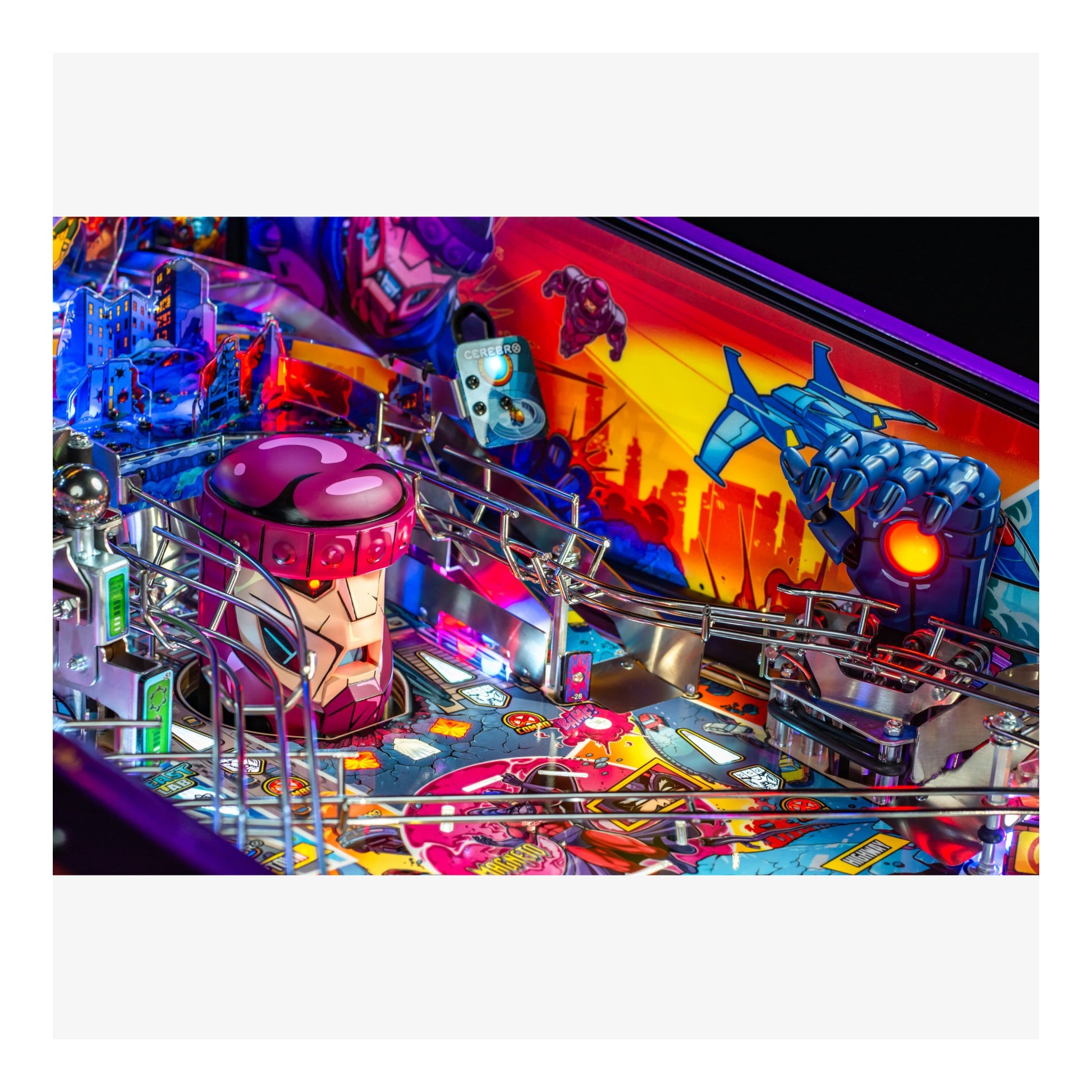 Colorful pinball machine with vibrant graphics and bright lights.