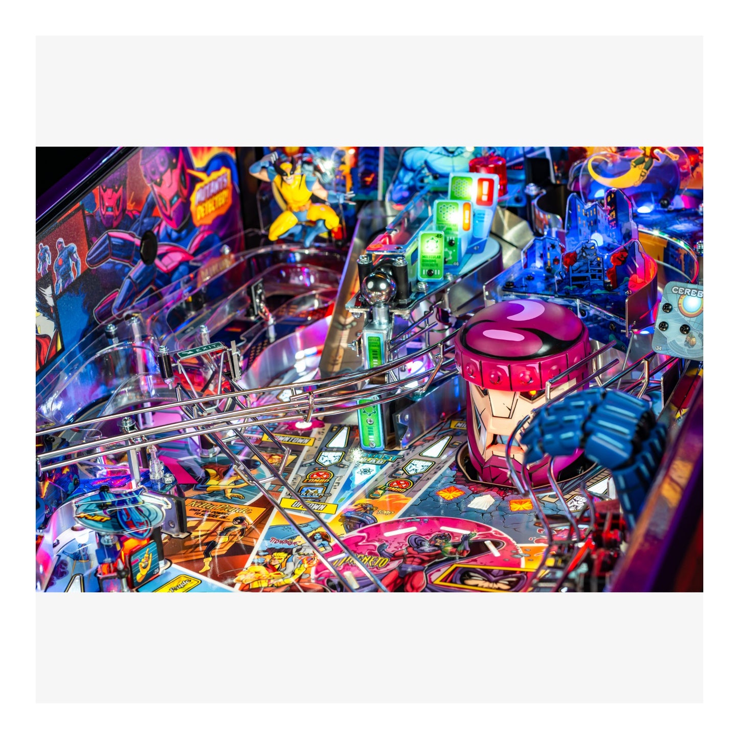 Colorful pinball machine with various lights and players in an arcade setting