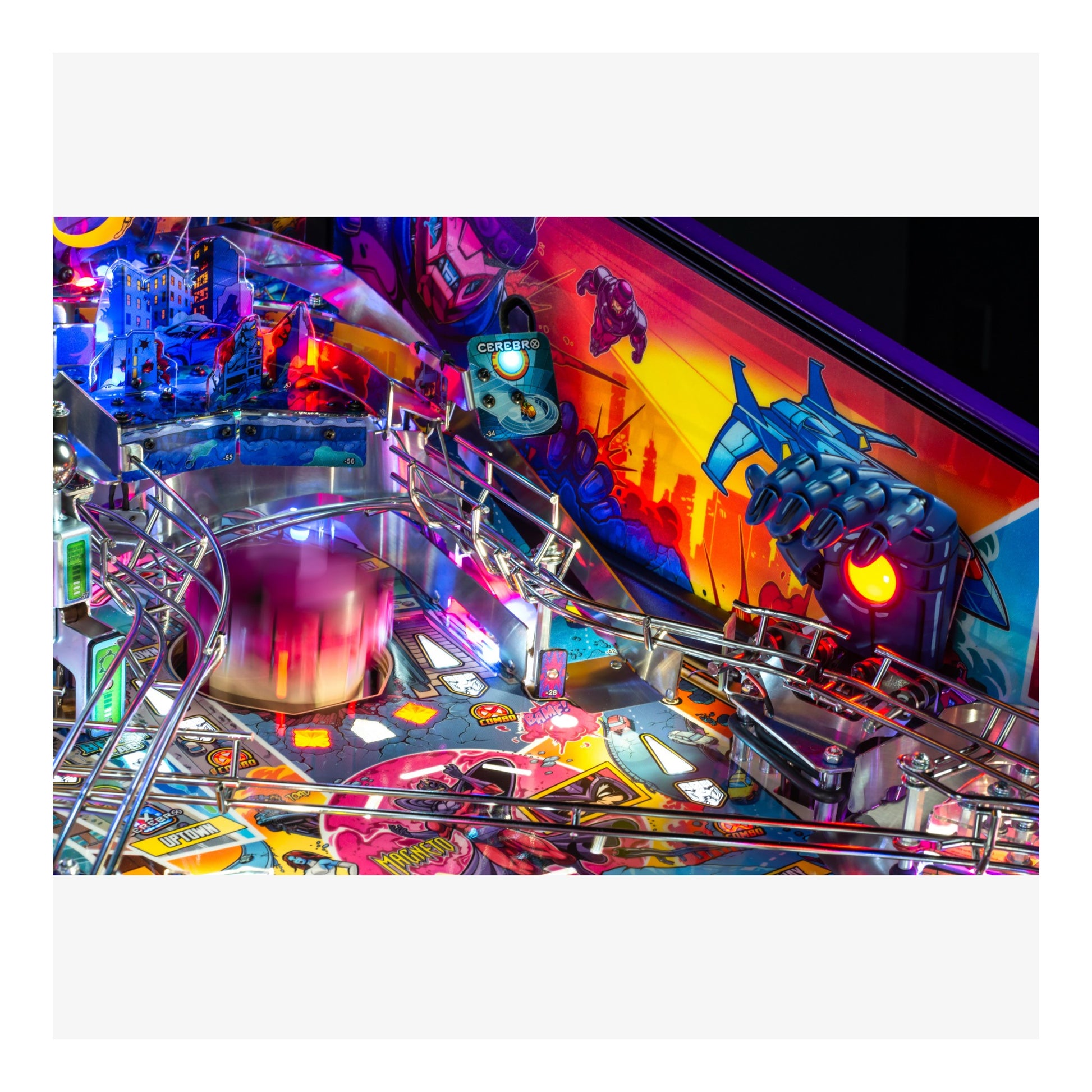 Colorful pinball machine with vibrant graphics and lights.