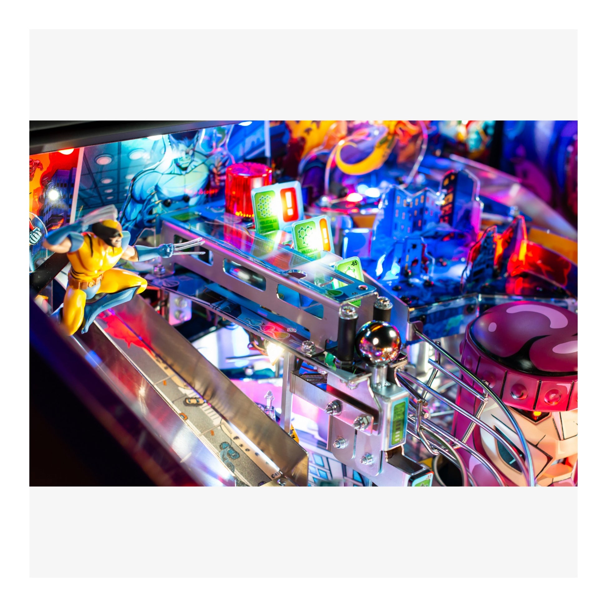 Close-up of a colorful pinball machine with vibrant lights and details.