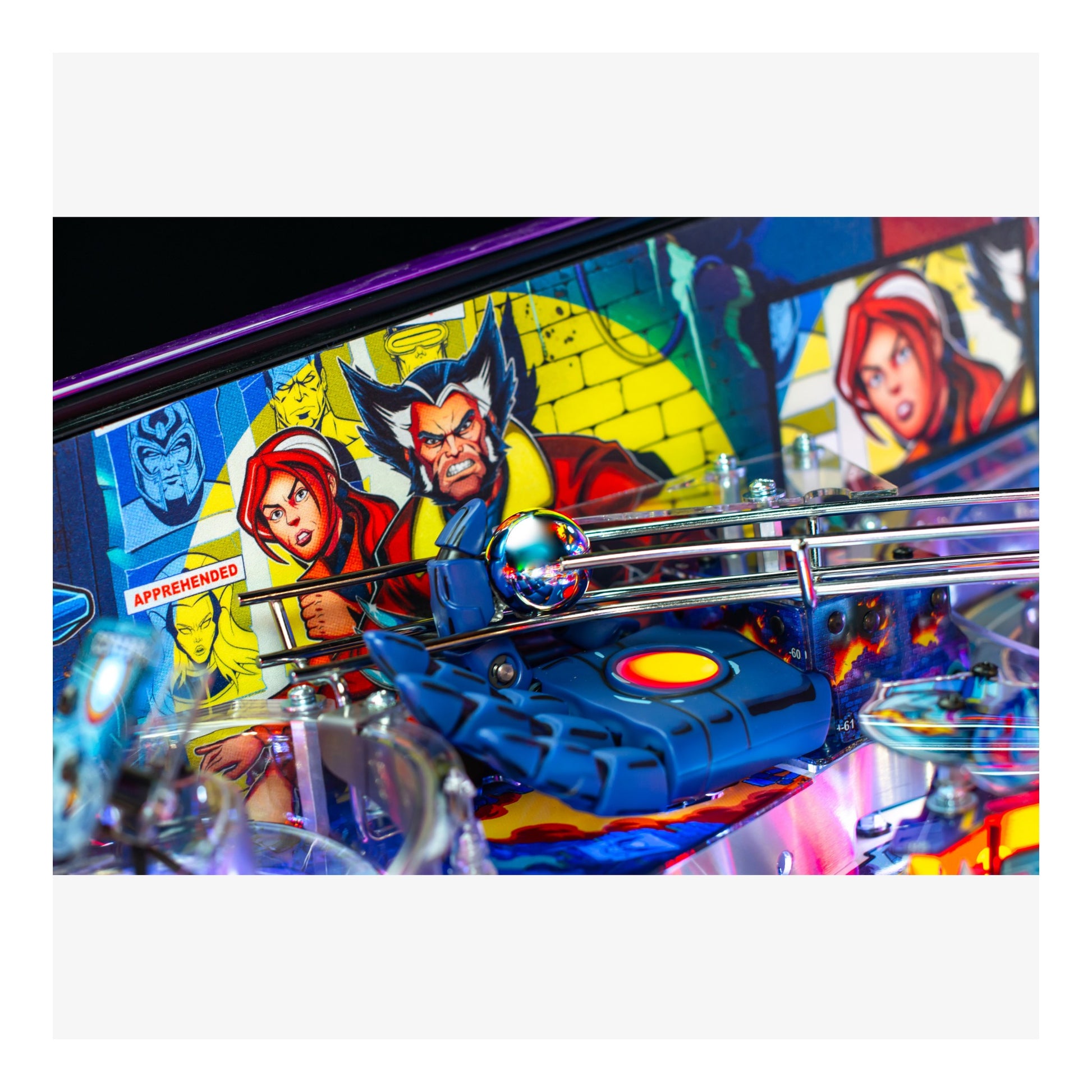 Pinball machine with colorful artwork featuring superhero characters.