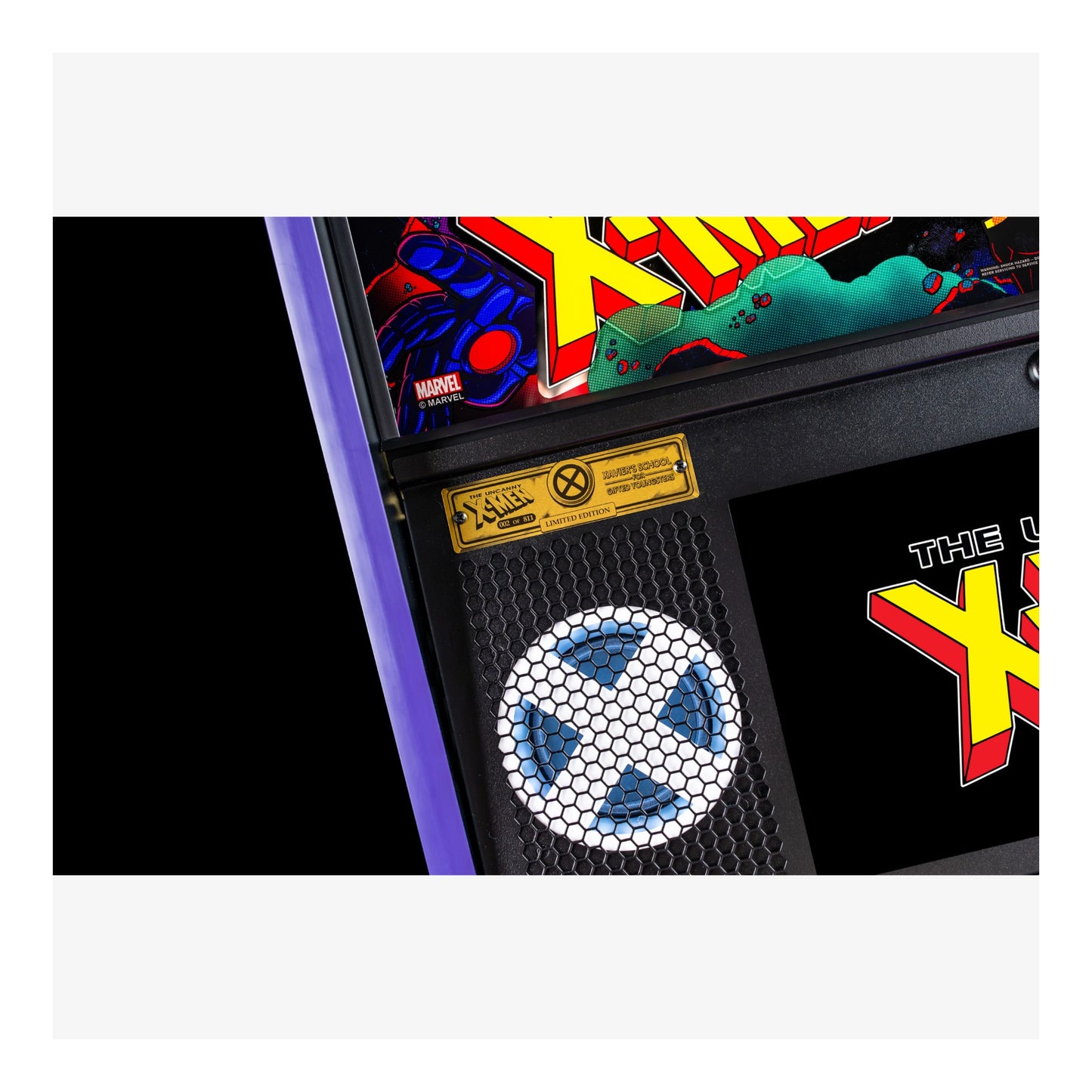 Close-up of a Marvel X-Men themed arcade machine panel with colorful graphics and branding.