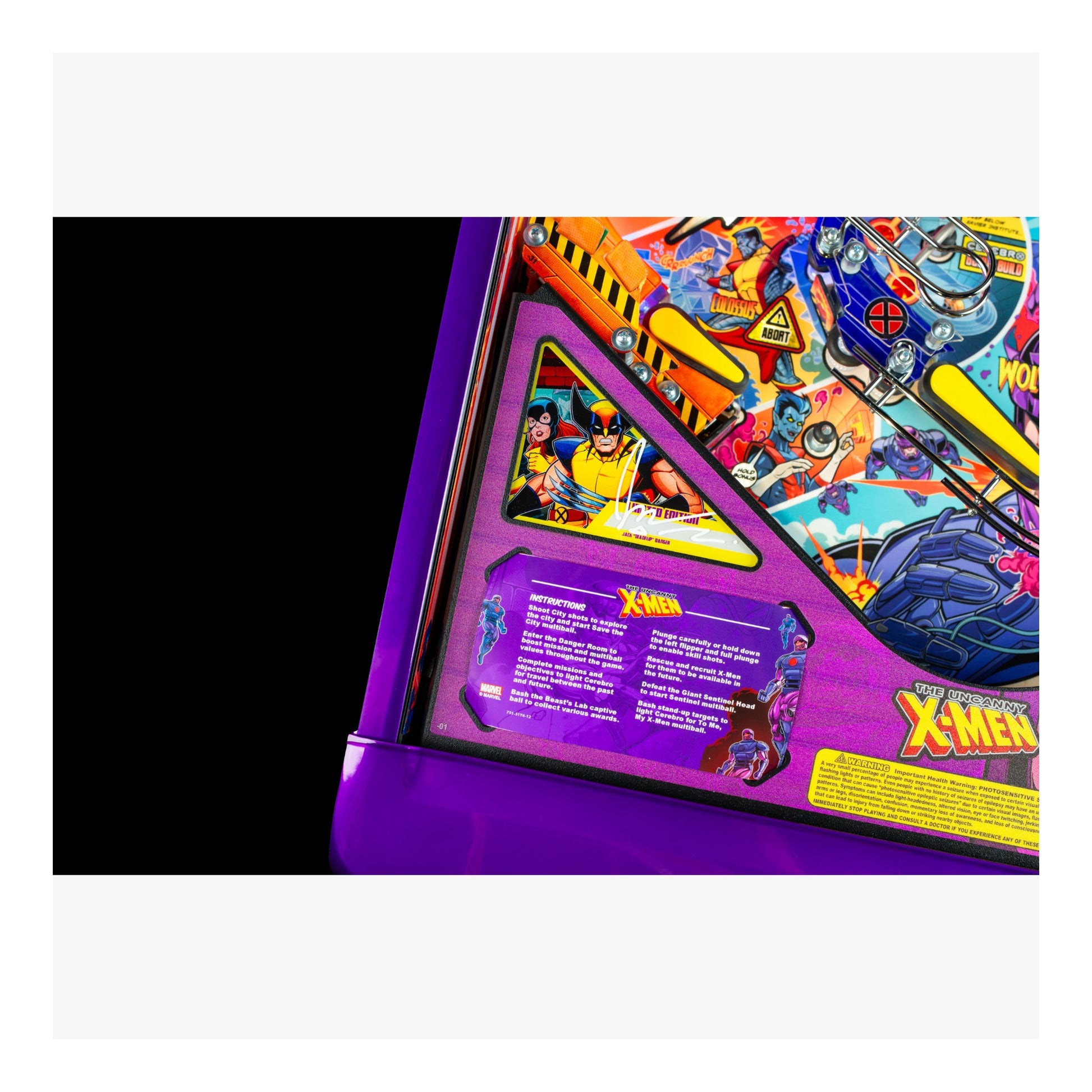 Colorful pinball machine with X-Men theme on a white background