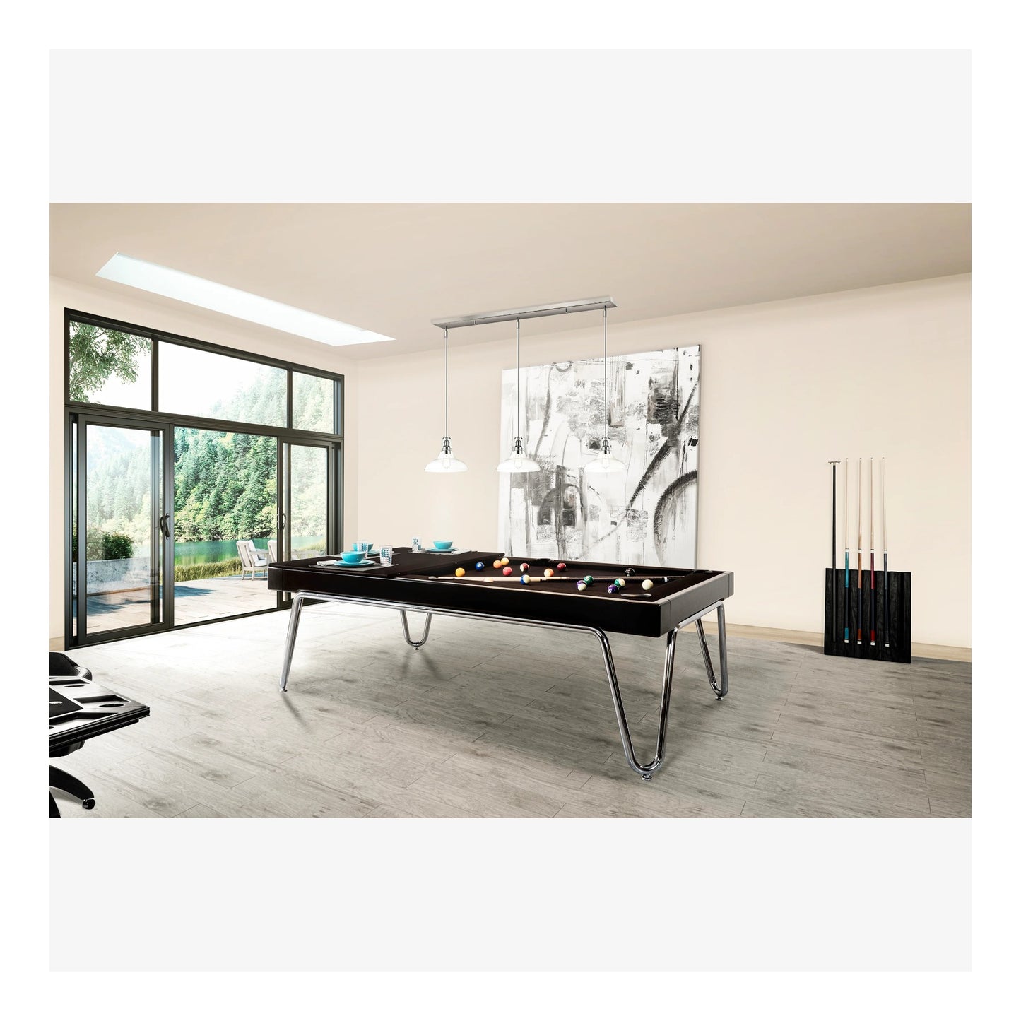 Foosball table in a room with a painting on the wall