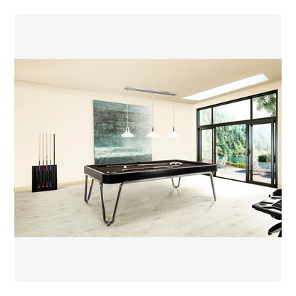 Modern pool table in a room with large windows and a view of greenery