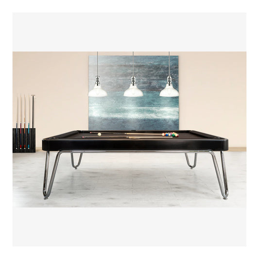 Modern pool table with billiard balls in a room with a painting and lamps.