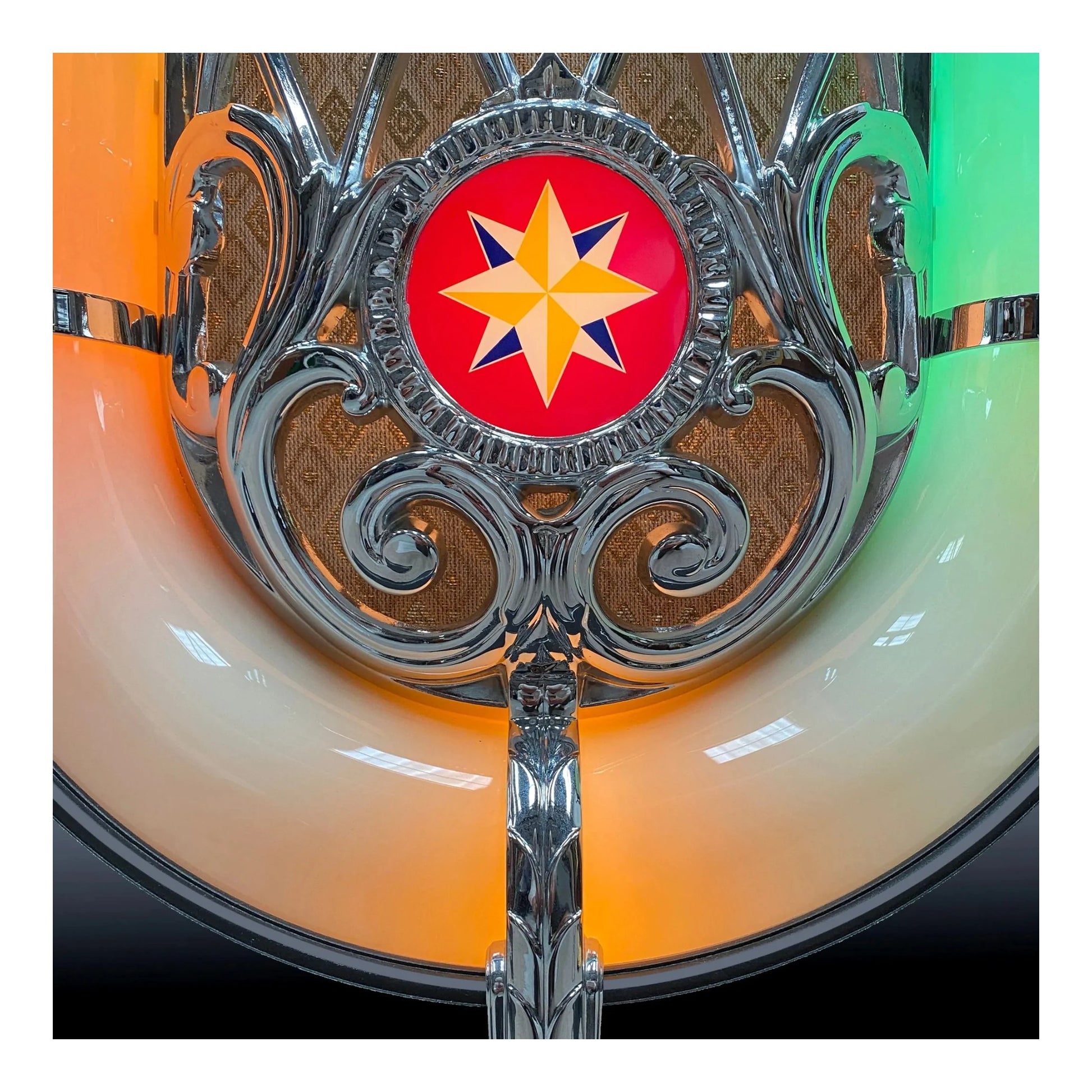Decorative emblem with a star design on a colorful background