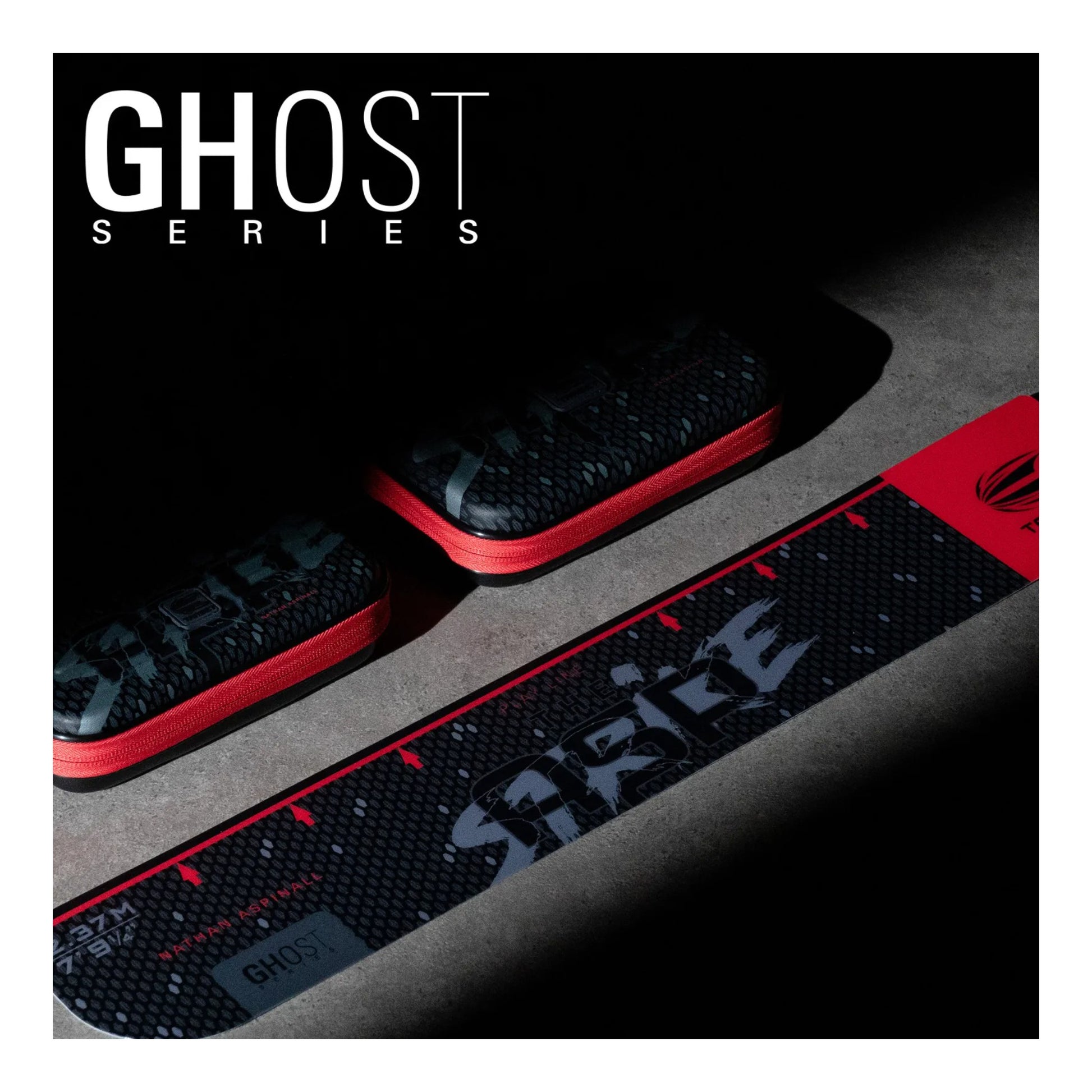 Close up of The Asp signature logo on red throw line