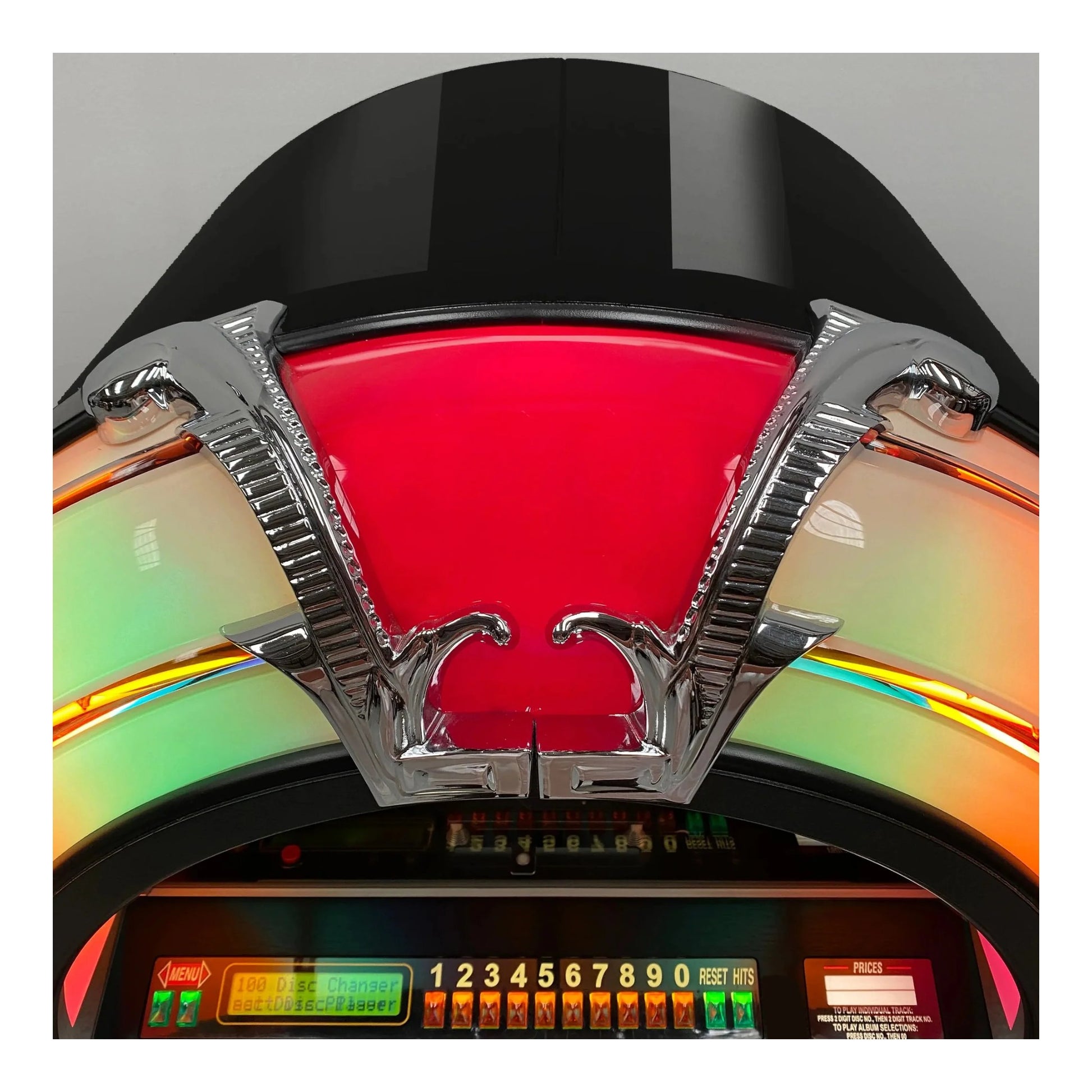 Close-up of a colorful jukebox with a red interior