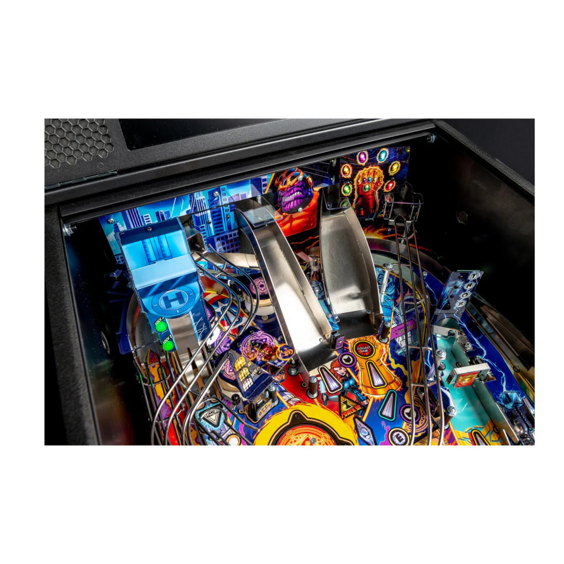 Close-up of a colorful pinball machine with vibrant graphics and mechanical components.