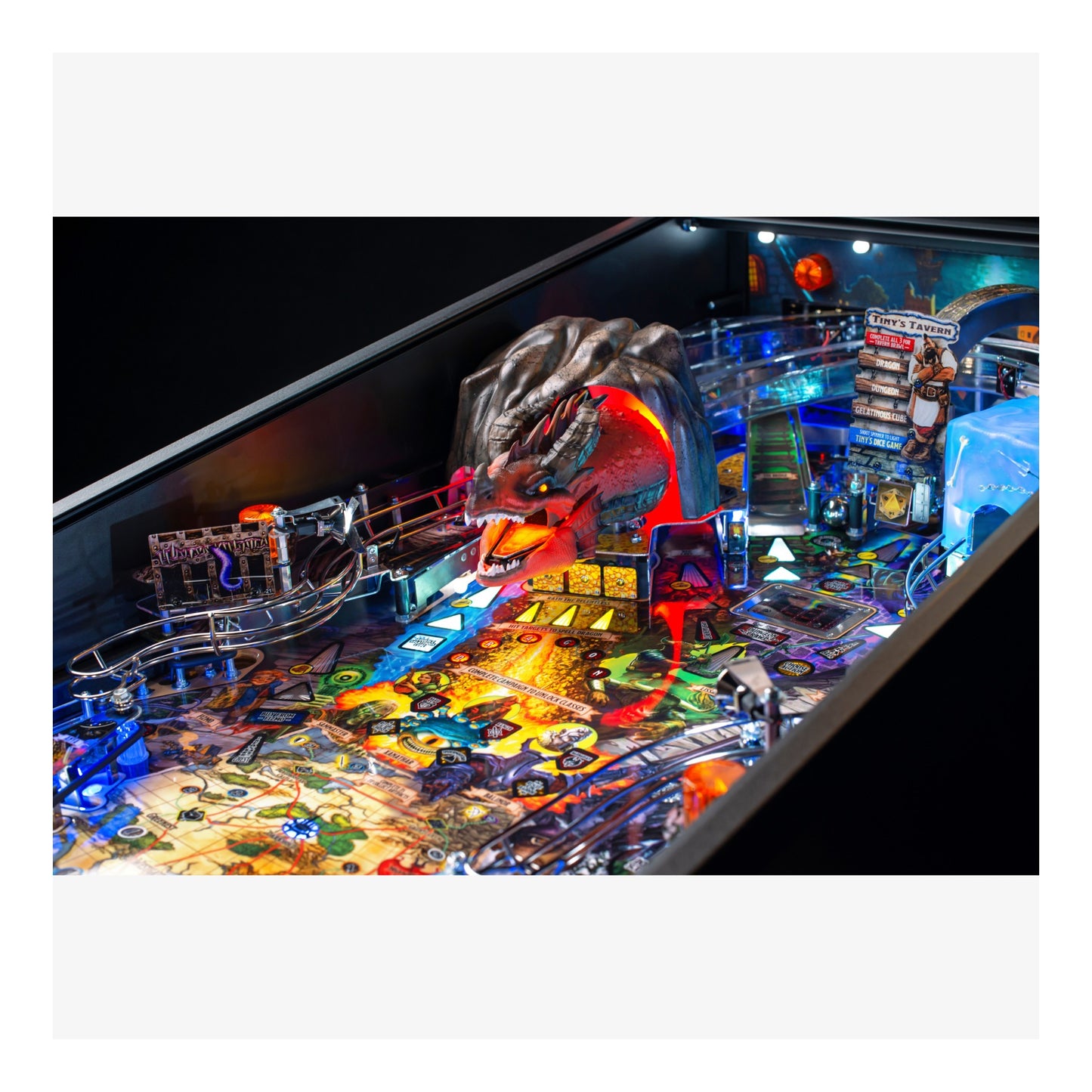 Pinball machine with colorful lights and detailed design