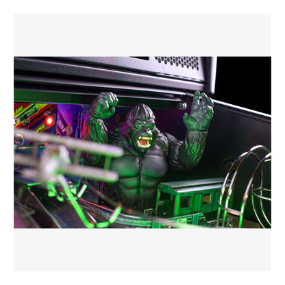 Pinball machine with a green monster figure in the playfield