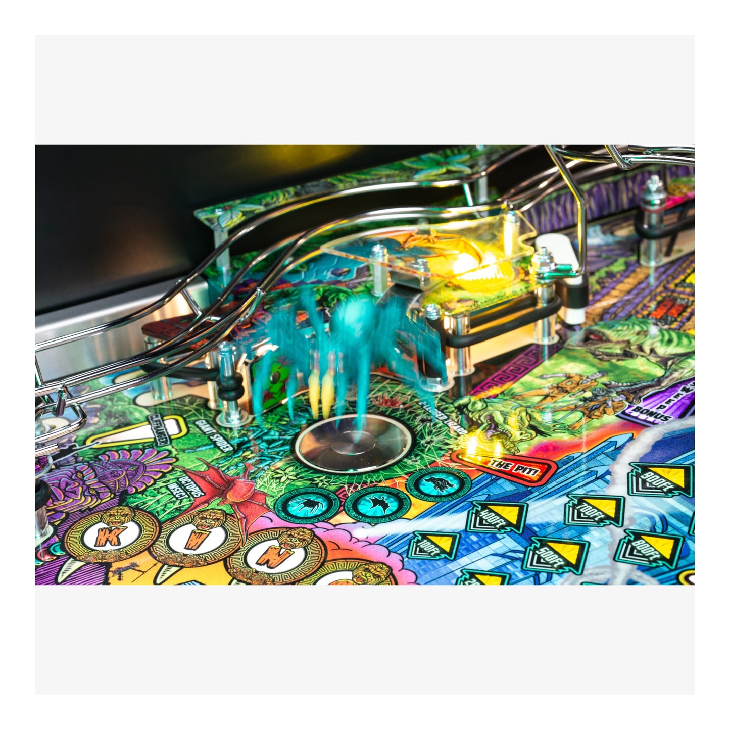 Close-up of a colorful pinball machine with vibrant graphics and bright lights.