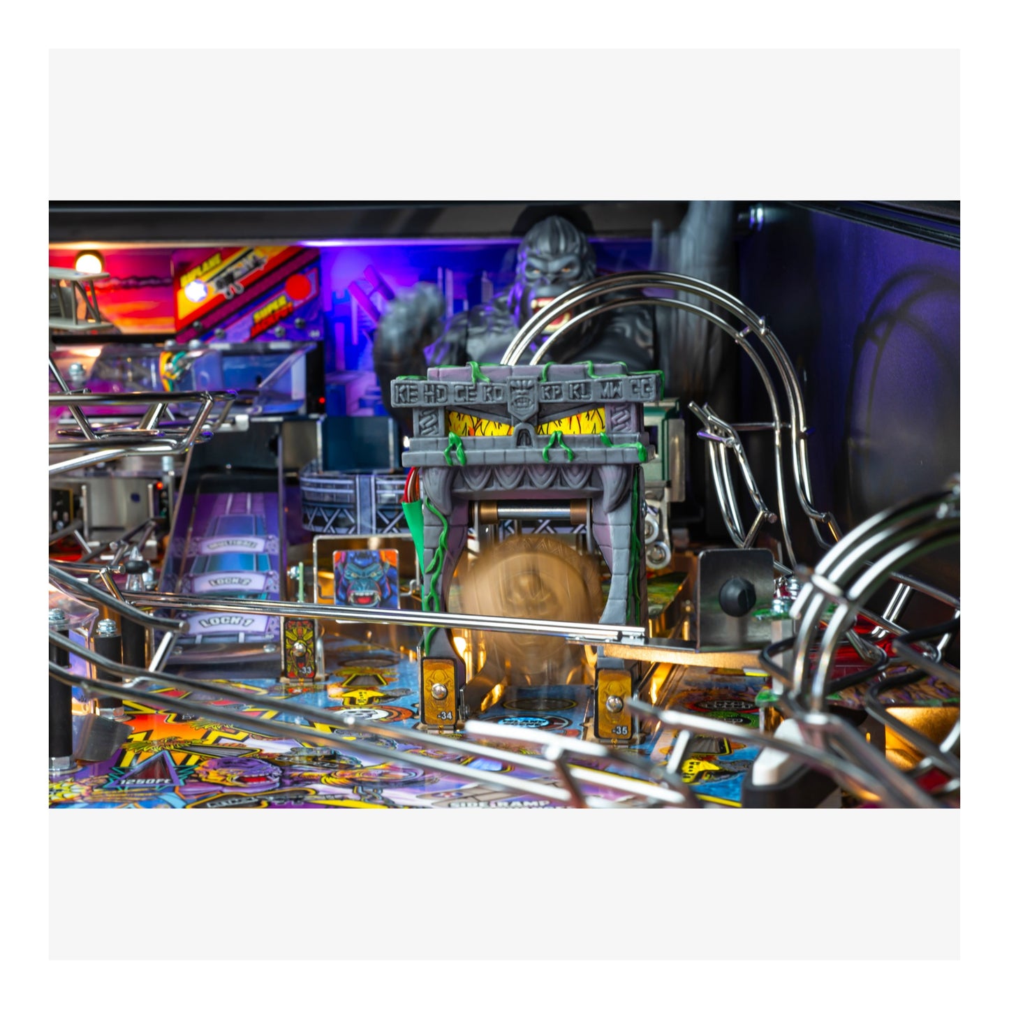 Pinball machine with colorful lights and intricate design