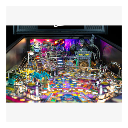 Pinball machine with colorful design and various components on a black background