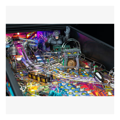 Pinball machine with colorful design and characters on a white background