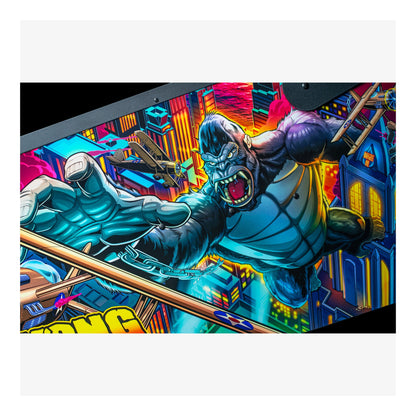 Colorful pinball machine with a large, animated character on a white background