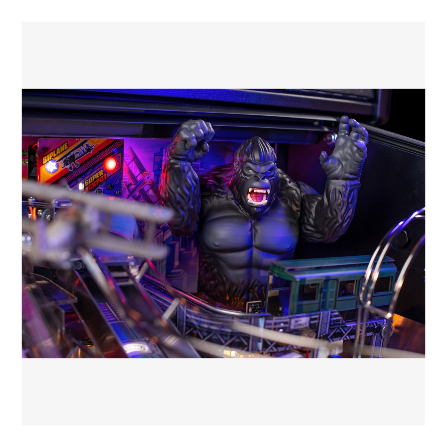 Pinball machine with a gorilla figure in the playfield
