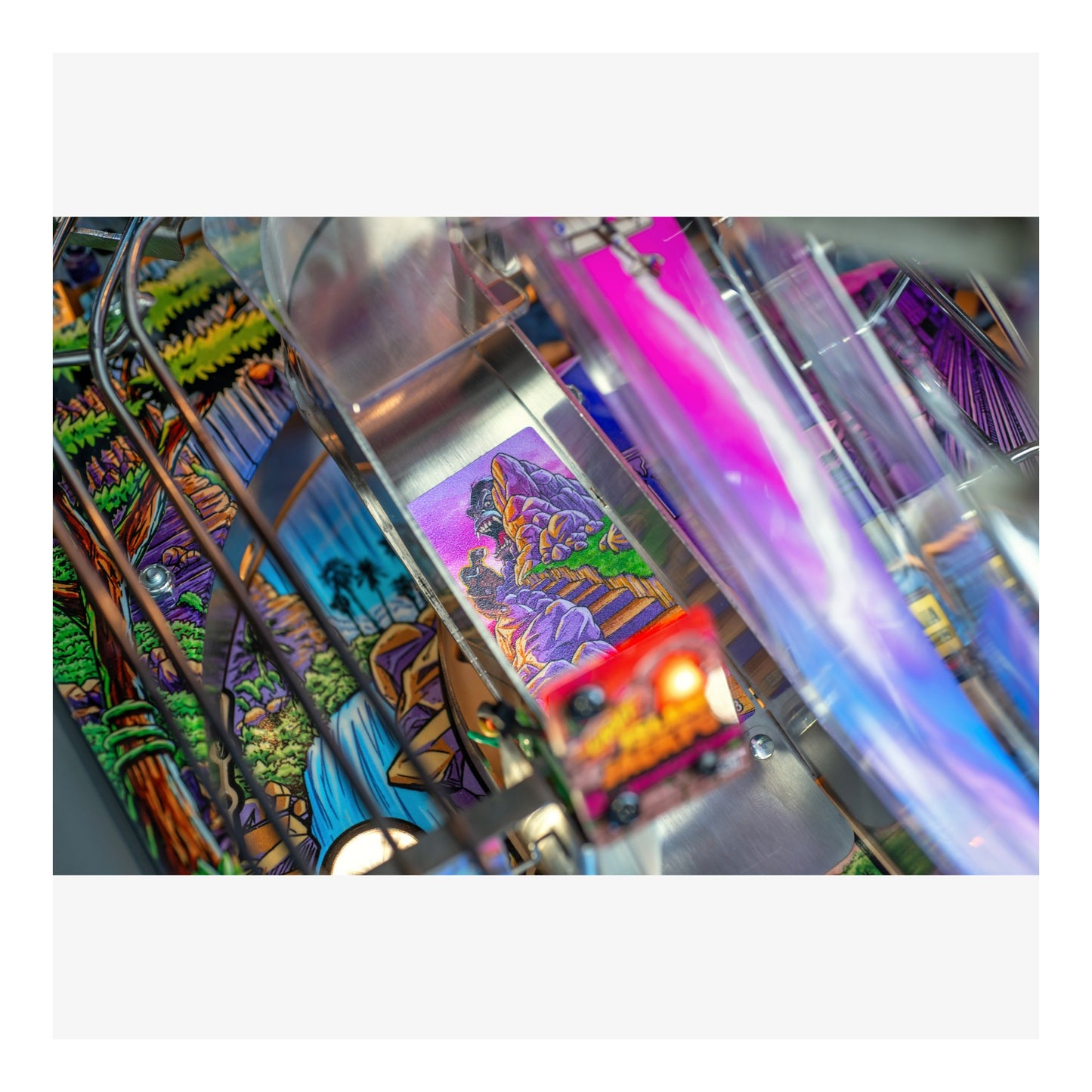 Colorful pinball machine with vibrant artwork and lights