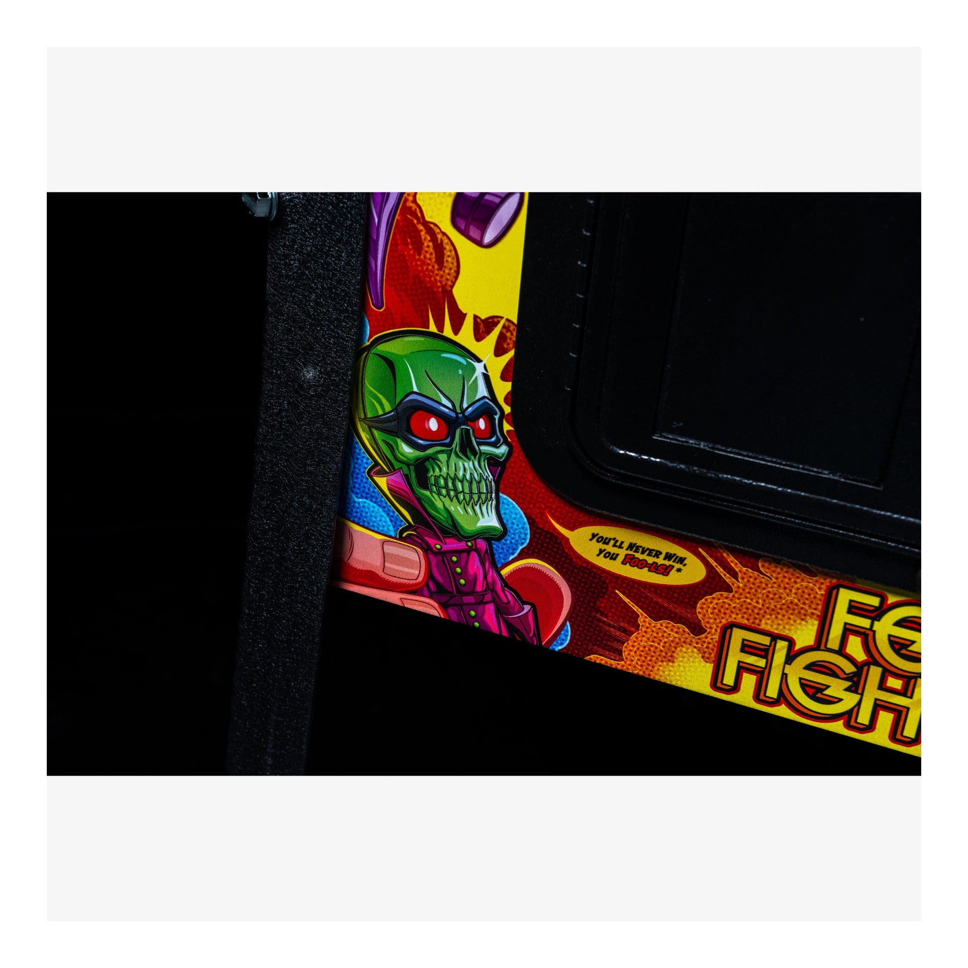 Colorful arcade machine cabinet with a character design on a black background