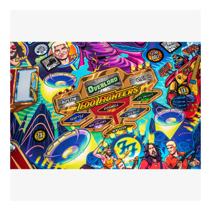 Colorful pinball machine layout with various characters and logos.