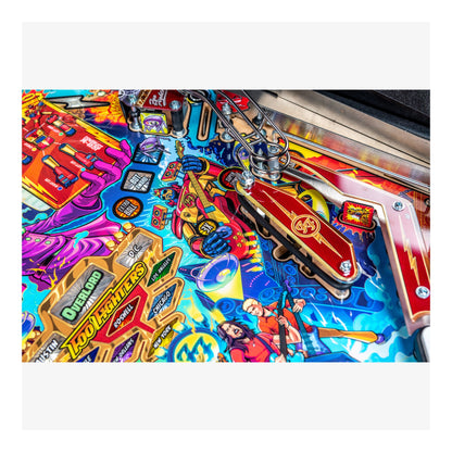 Close-up of a colorful pinball machine with vibrant graphics and detailed design.