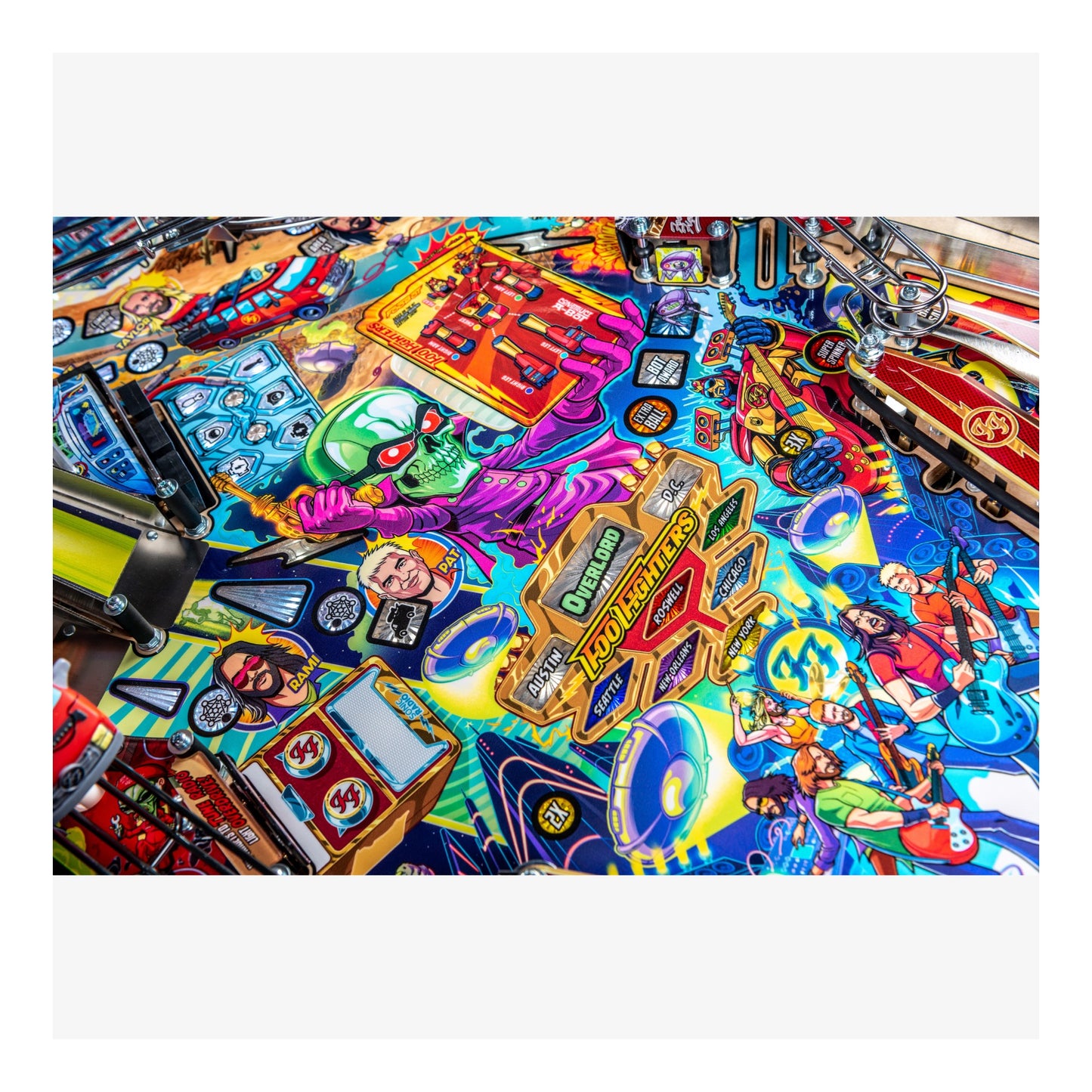 Colorful pinball machine with various symbols and characters on a white background