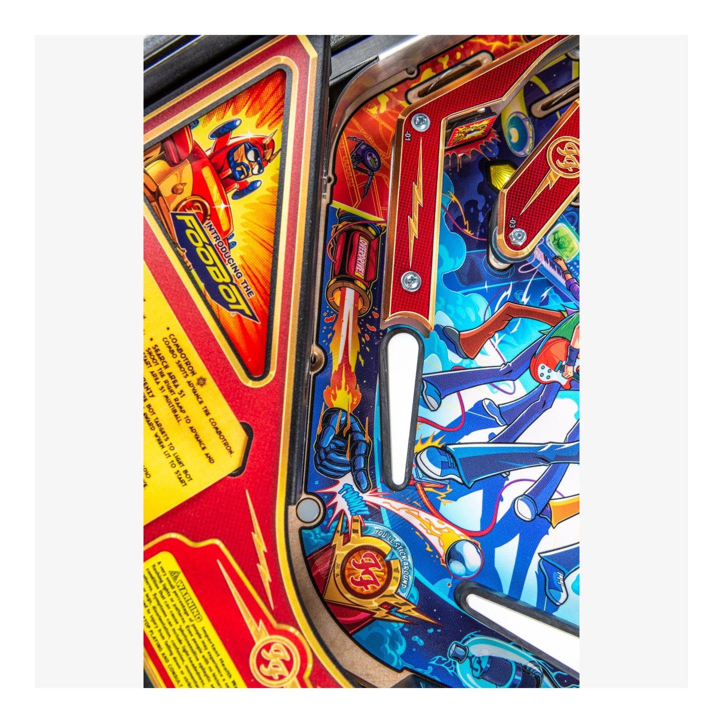 Close-up of a colorful pinball machine with vibrant graphics and bright colors.