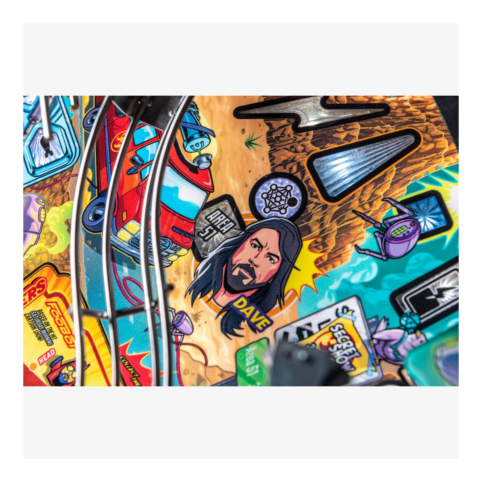 Colorful pinball machine with a character design on the playfield