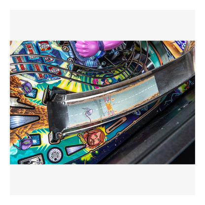 Close-up of a colorful pinball machine with detailed artwork