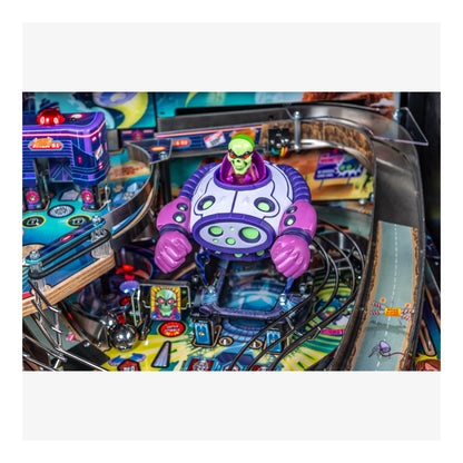 Pinball machine with a colorful alien figure on the playfield