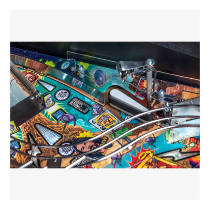 Close-up of a colorful pinball machine with various symbols and designs.