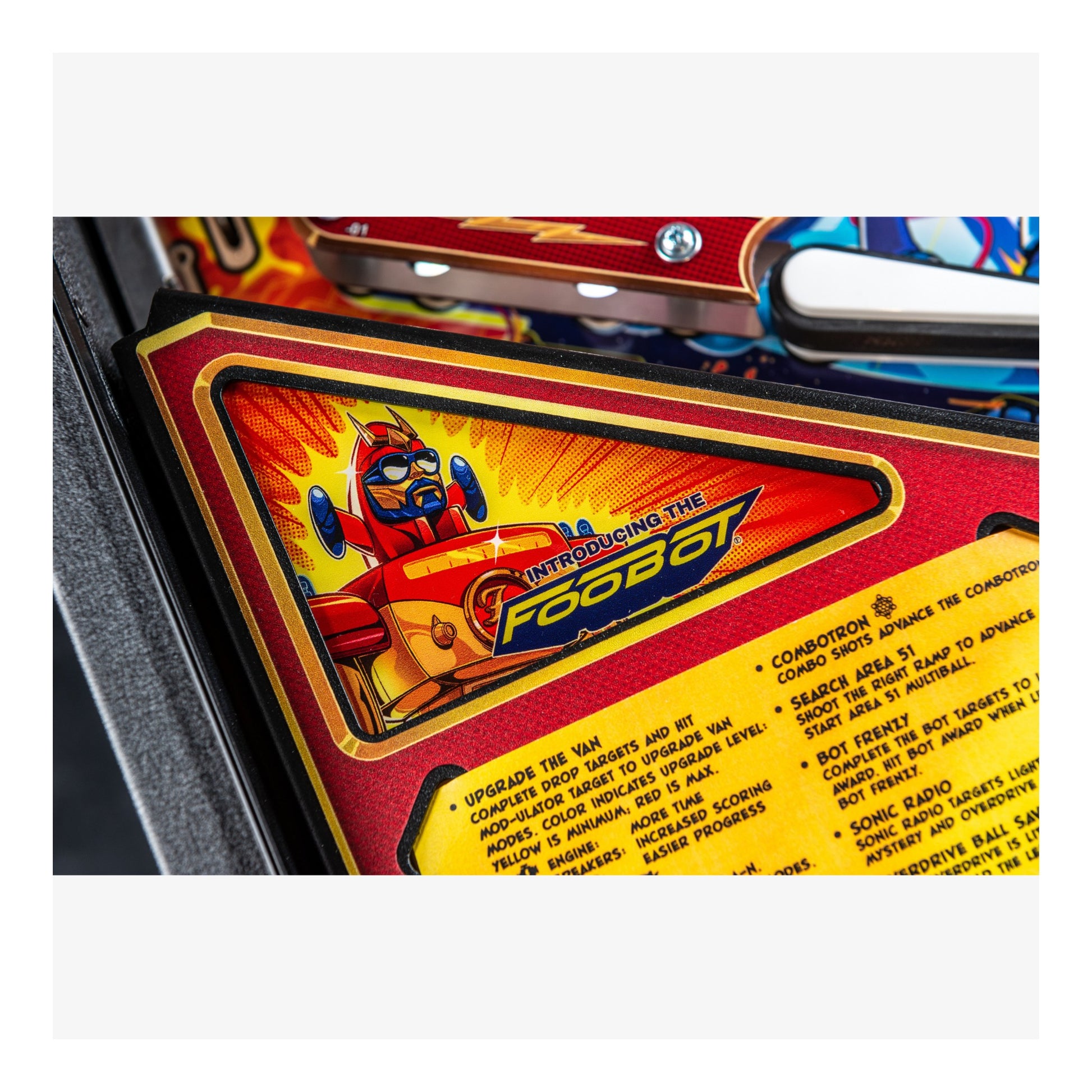 Pinball machine with 'Introducing the Fooboo' label and character illustration on a red background.