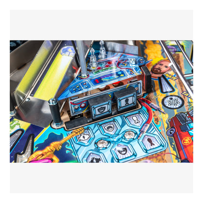 Close-up of a colorful pinball machine with various components.