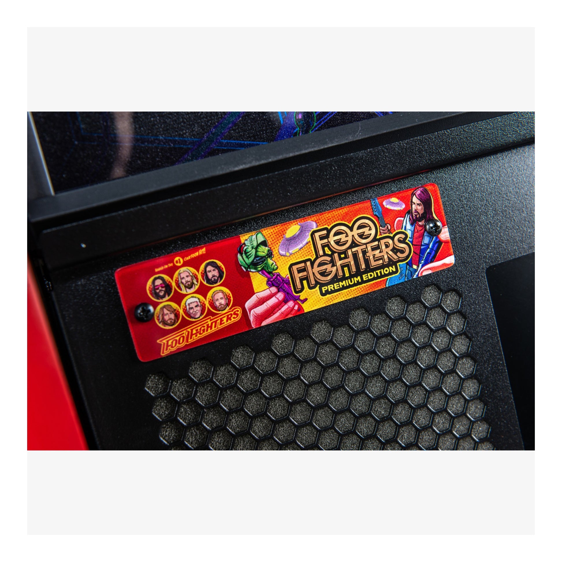 Foo Fighters arcade machine cabinet with a colorful label featuring band members.