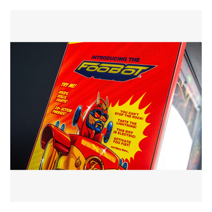 Vintage-style packaging of a robot toy with red and yellow design elements.