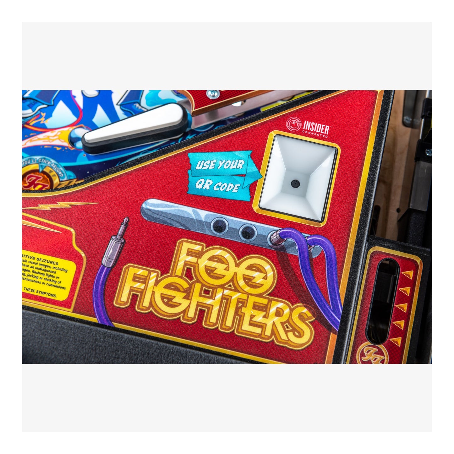 Pinball machine with 'Foo Fighters' branding and colorful design