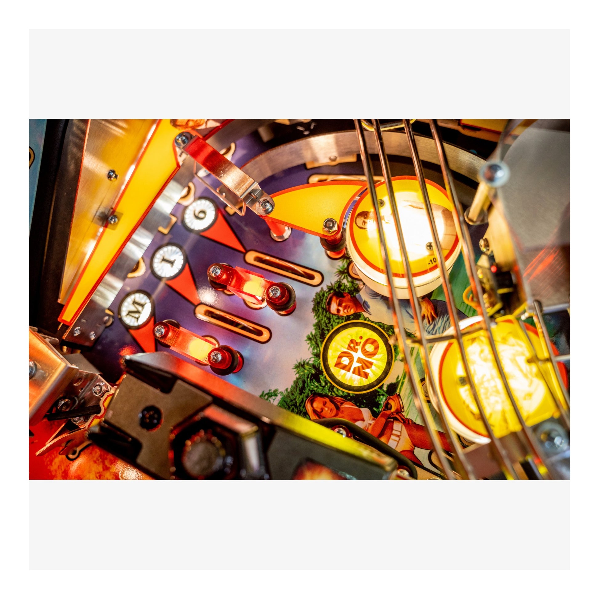 Close-up of a pinball machine with vibrant colors and intricate details.