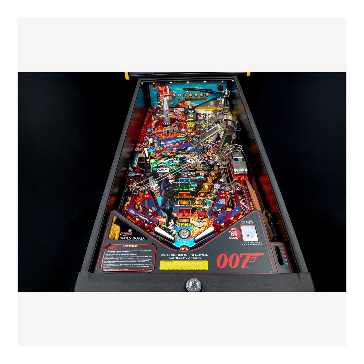 Pinball machine with '007' theme on a black background