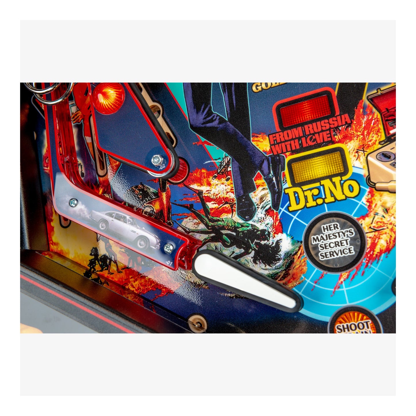 Close-up of a pinball machine with 'From Russia with Love' theme featuring James Bond elements.