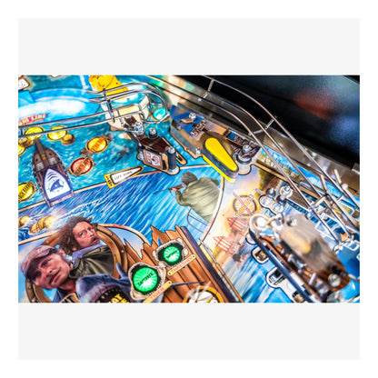 Close-up of a pinball machine with detailed artwork and playfield.