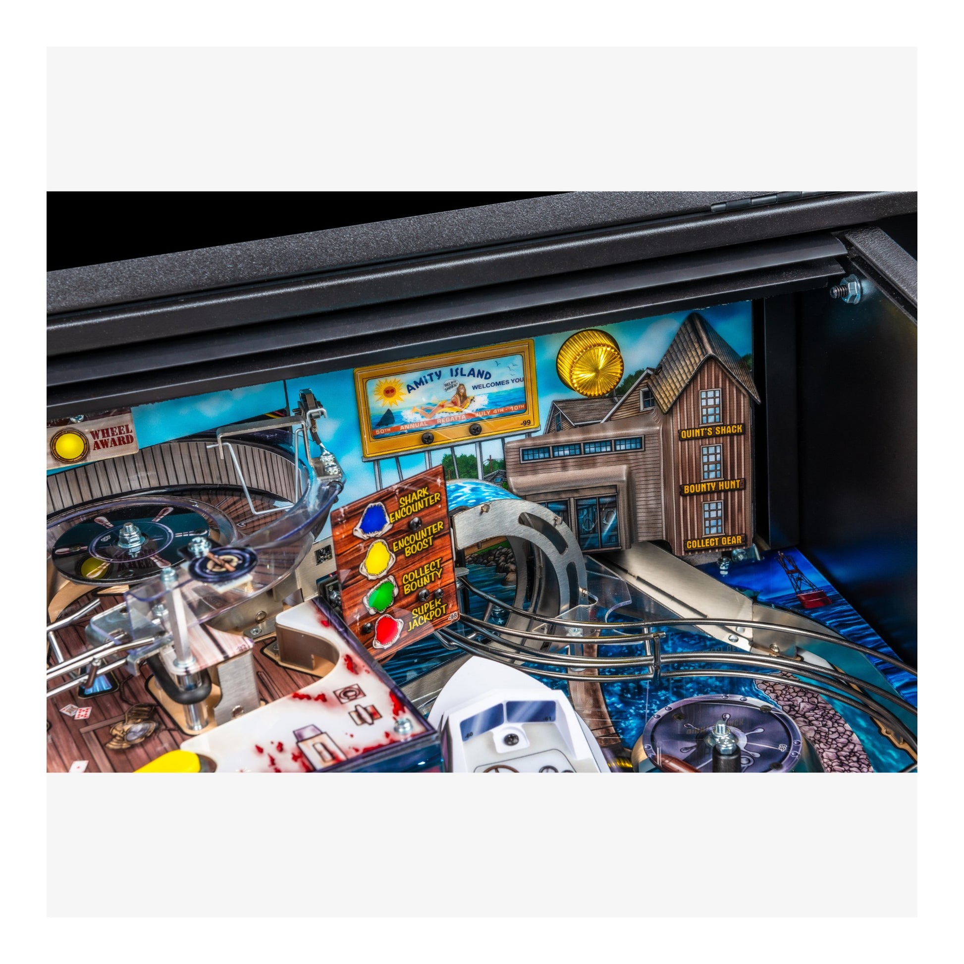 Close-up of a pinball machine with detailed artwork and player control panel.