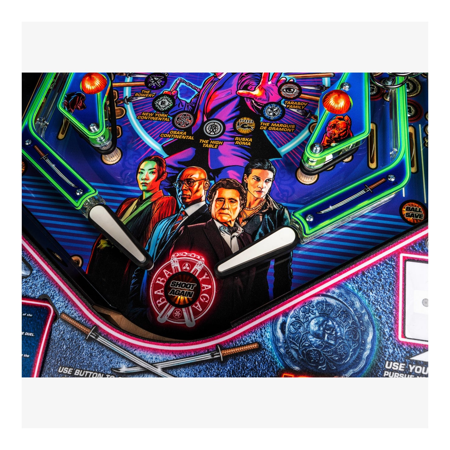 Close-up of a colorful pinball machine with characters and 'Paramount Pictures' logo.