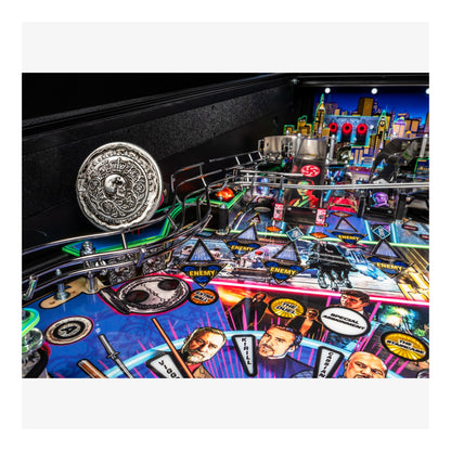 Close-up of a pinball machine with colorful playfield and various components.