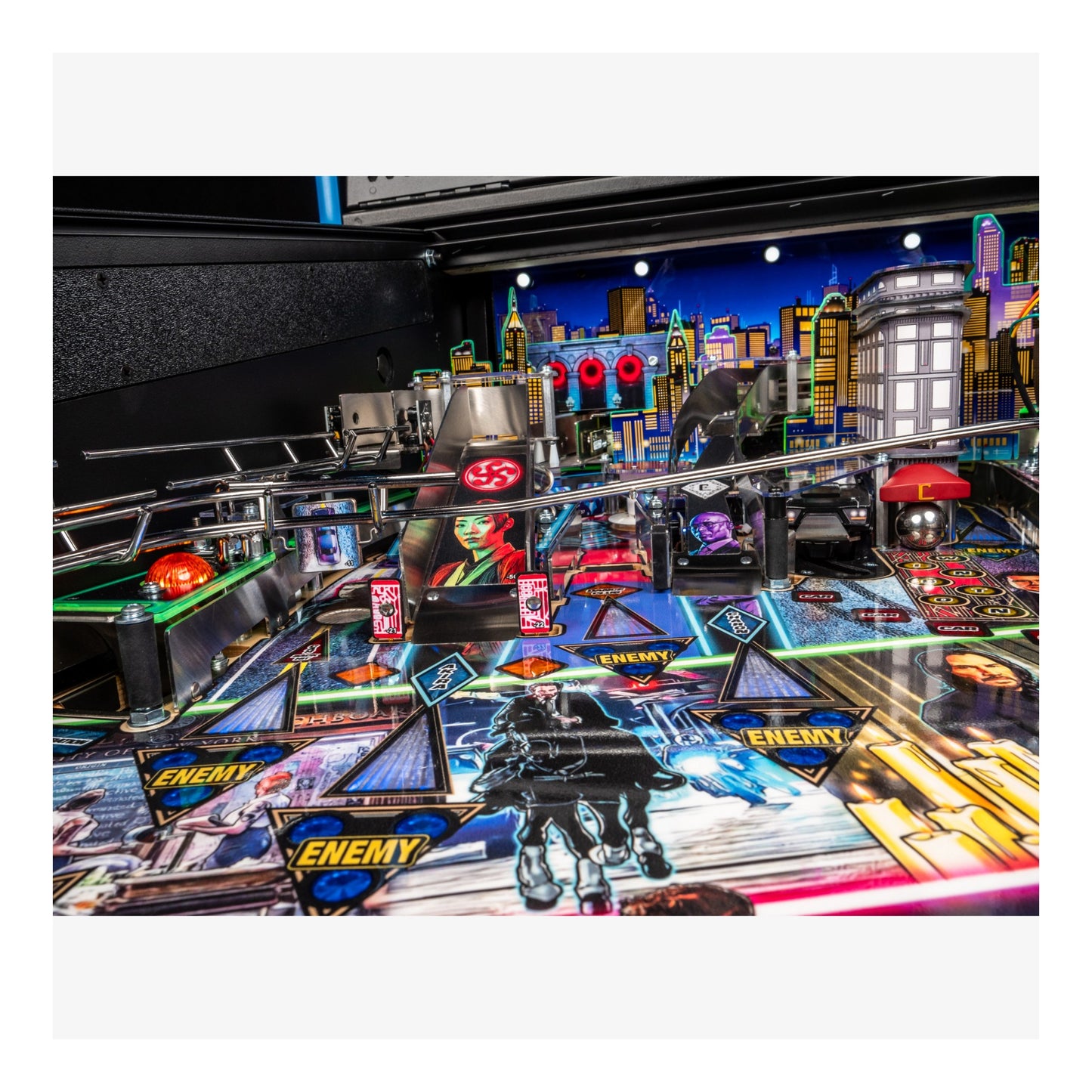 Pinball machine with colorful design and cityscape background in an arcade setting