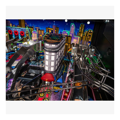 Pinball machine with colorful cityscape background