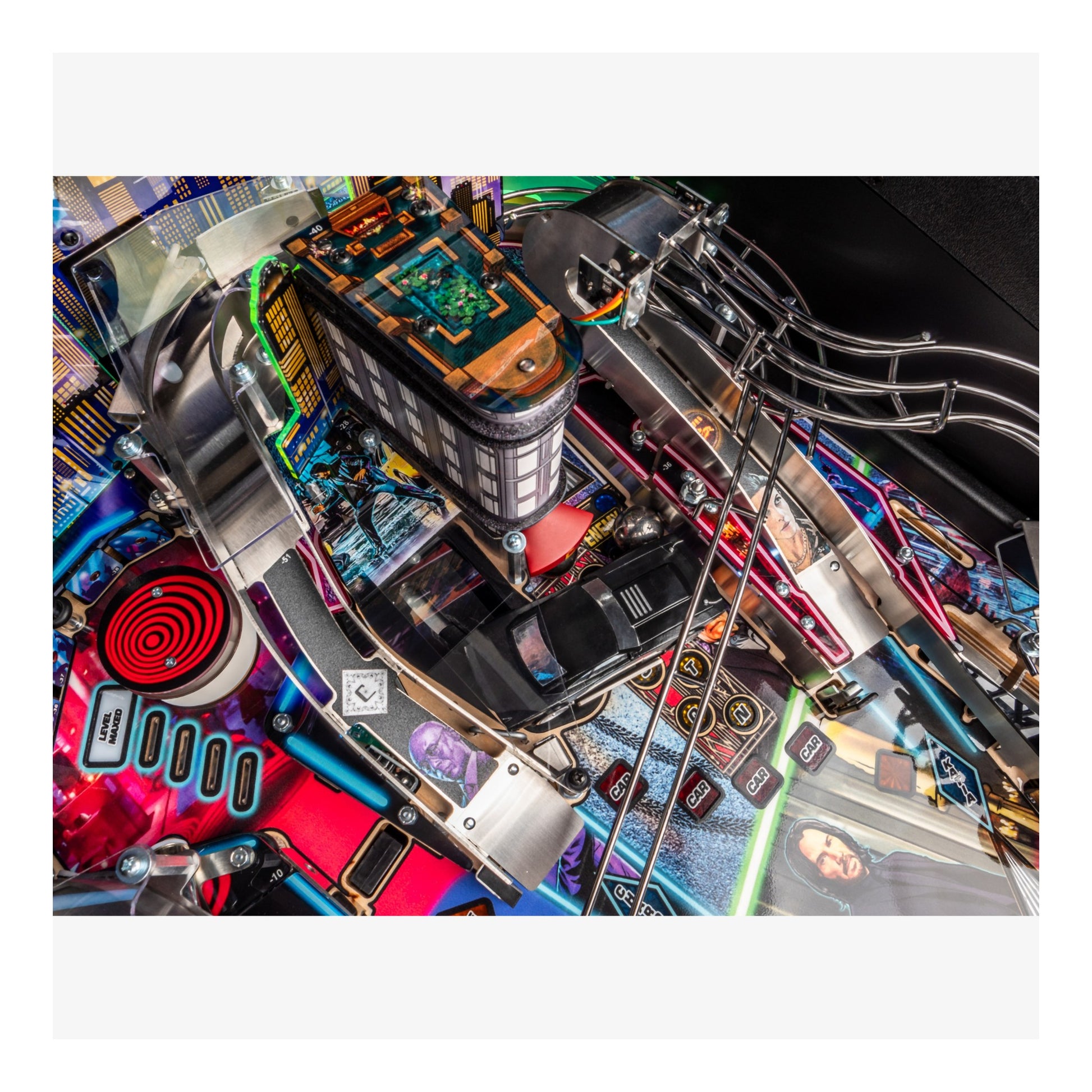 Close-up of a colorful pinball machine with intricate details