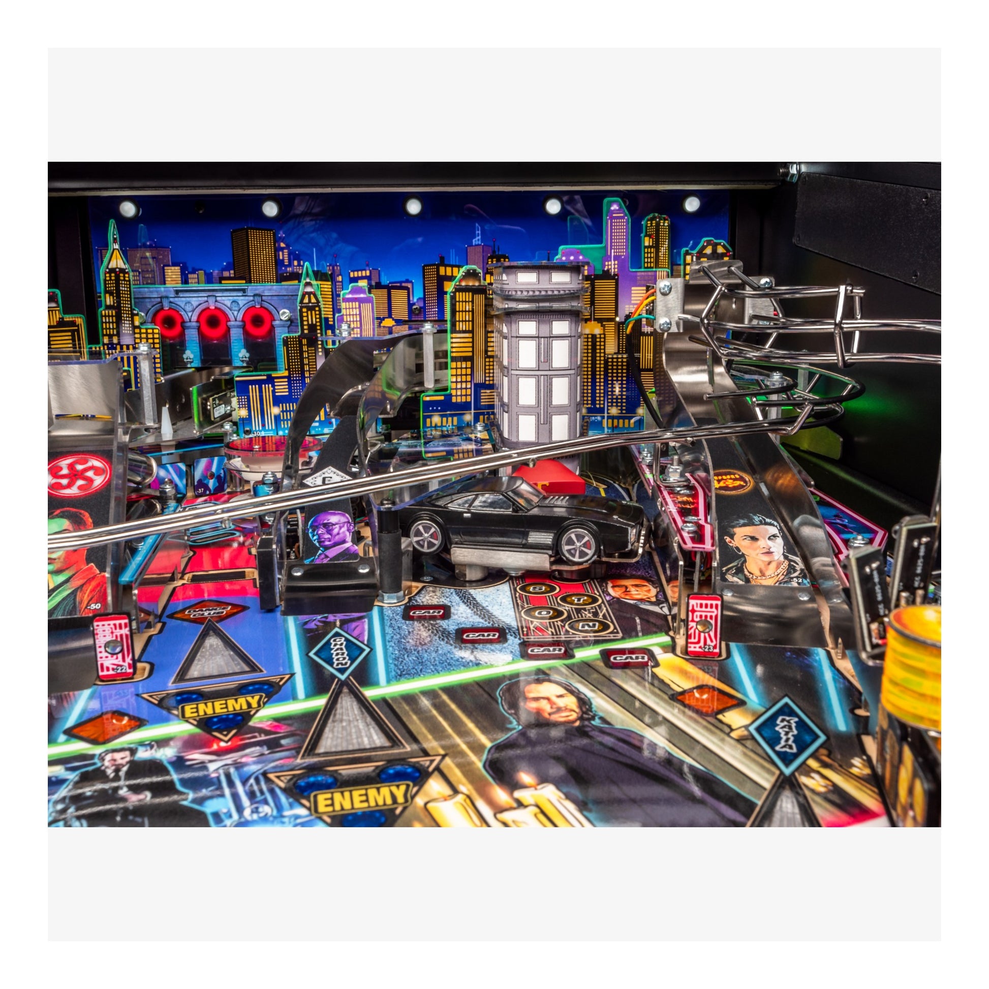 Pinball machine with colorful design and cityscape background