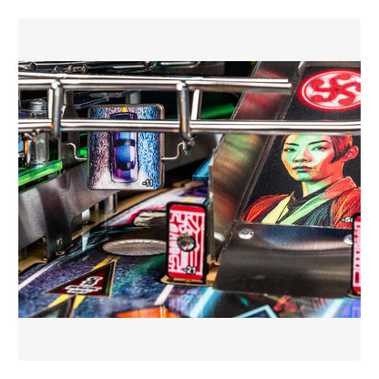 Close-up of a pinball machine with a character on the playfield