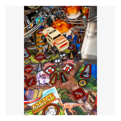 Close-up of a pinball machine with 'Escape Nuclear' theme and various game elements.